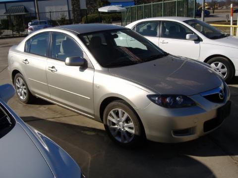 Sunlight Silver Metallic Mazda MAZDA3 i Touring Sedan.  Click to enlarge.