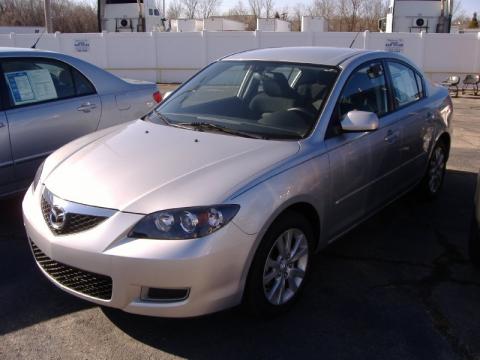 Sunlight Silver Metallic Mazda MAZDA3 i Touring Sedan.  Click to enlarge.