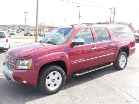 Sport Red Metallic Chevrolet Suburban 1500 Z71 4x4.  Click to enlarge.