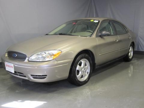 Arizona Beige Metallic Ford Taurus SE.  Click to enlarge.