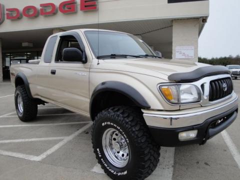 Mystic Gold Metallic Toyota Tacoma V6 TRD Xtracab 4x4.  Click to enlarge.