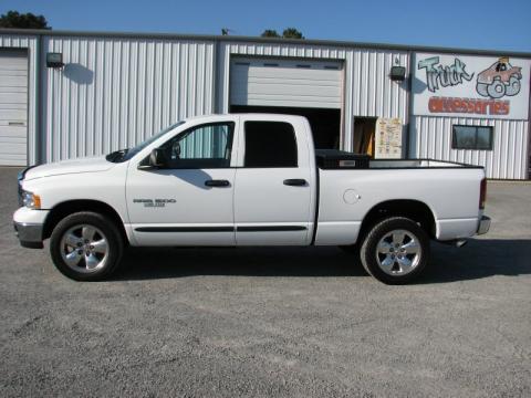 Bright White Dodge Ram 1500 SLT Quad Cab 4x4.  Click to enlarge.