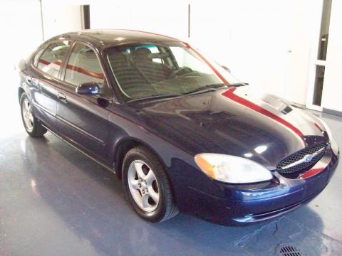 Medium Royal Blue Metallic Ford Taurus SES.  Click to enlarge.