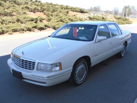 White Cadillac DeVille Sedan.  Click to enlarge.