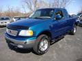 Front 3/4 View of 2000 Ford F150 XLT Extended Cab 4x4 #2