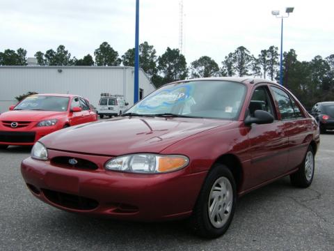 Toreador Red Metallic Ford Escort LX Sedan.  Click to enlarge.