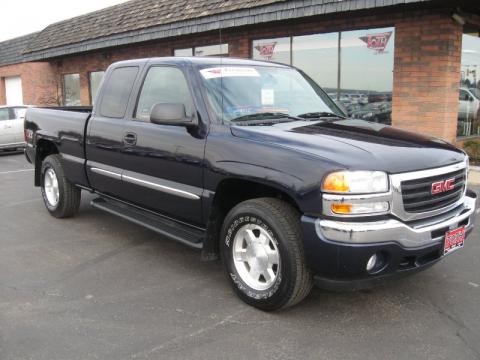 Deep Blue Metallic GMC Sierra 1500 SLT Extended Cab 4x4.  Click to enlarge.