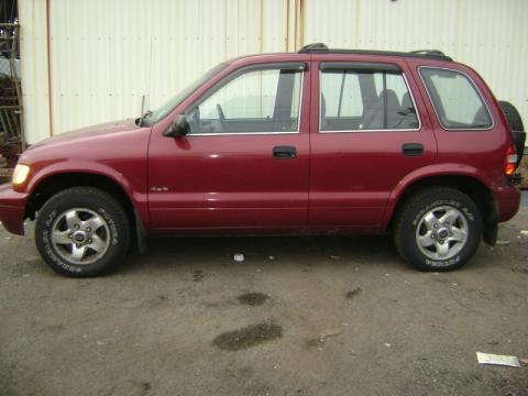 Garnet Red Kia Sportage 4x4.  Click to enlarge.
