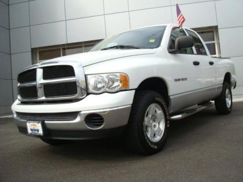 Bright White Dodge Ram 1500 SLT Quad Cab 4x4.  Click to enlarge.