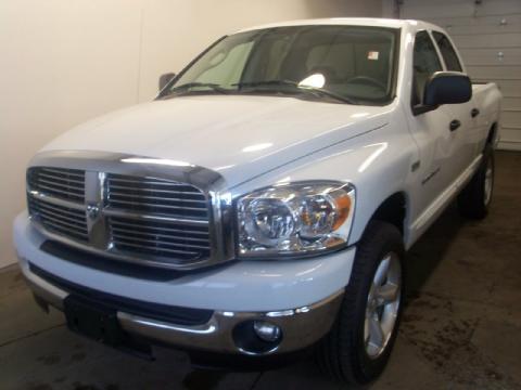 Bright White Dodge Ram 1500 SLT Quad Cab 4x4.  Click to enlarge.