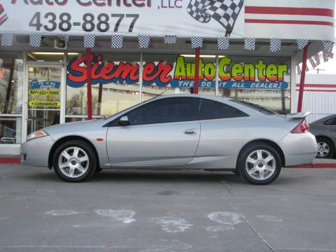 Silver Frost Metallic 2001 Mercury Cougar V6 with Midnight Black interior 
