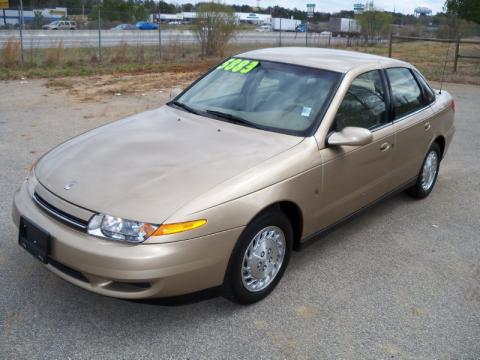Medium Gold Saturn L Series L200 Sedan.  Click to enlarge.