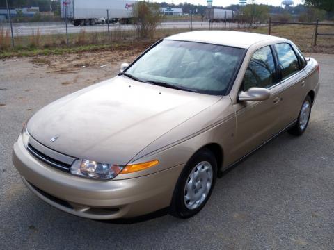 Medium Gold Saturn L Series L200 Sedan.  Click to enlarge.