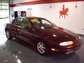 1998 Oldsmobile Aurora  Dark Toreador Red Metallic
