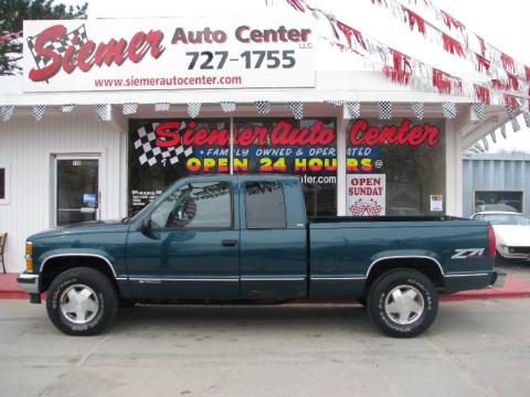 Forest Green Metallic Chevrolet C/K K1500 Silverado Z71 Extended Cab 4x4.  Click to enlarge.
