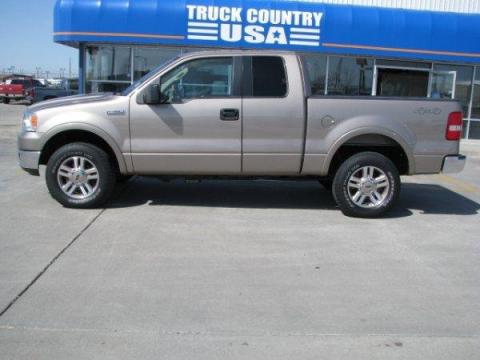 Arizona Beige Metallic Ford F150 Lariat SuperCab 4x4.  Click to enlarge.