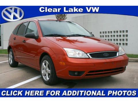 Sangria Red Metallic Ford Focus ZX5 SES Hatchback.  Click to enlarge.