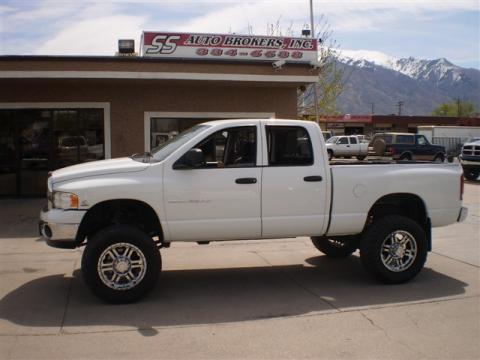 Bright White Dodge Ram 2500 SLT Quad Cab 4x4.  Click to enlarge.