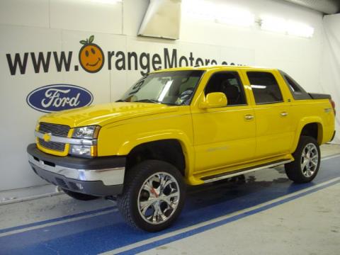 Yellow Chevrolet Avalanche 1500 Z71 4x4.  Click to enlarge.