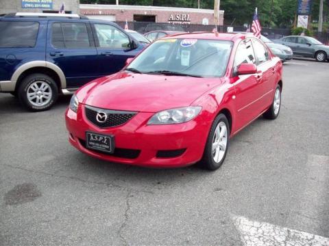Velocity Red Mica Mazda MAZDA3 i Sedan.  Click to enlarge.