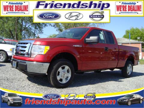 Red Candy Metallic Ford F150 XLT SuperCab 4x4.  Click to enlarge.