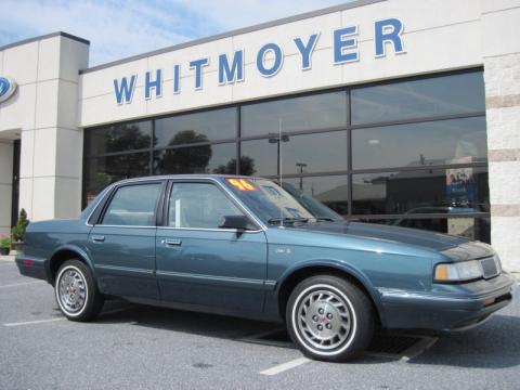 Medium Sea Green Metallic Oldsmobile Cutlass Ciera SL Sedan.  Click to enlarge.