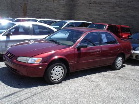 Vintage Red Pearl Toyota Camry LE.  Click to enlarge.