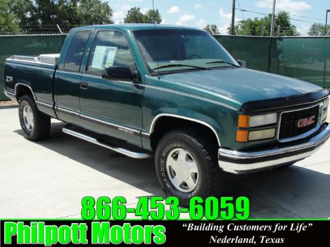 Laguna Green Metallic GMC Sierra 1500 SLT Extended Cab 4x4.  Click to enlarge.