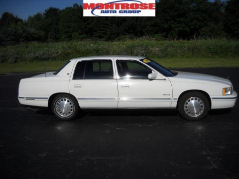 White Cadillac DeVille Sedan.  Click to enlarge.