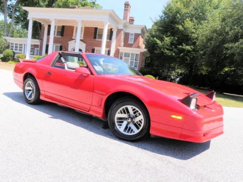 Brilliant Red Pontiac Firebird Trans Am Coupe.  Click to enlarge.