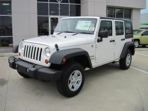 Stone White Jeep Wrangler Unlimited Sport 4x4 Right Hand Drive.  Click to enlarge.