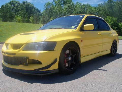 Lightning Yellow Mitsubishi Lancer Evolution VIII.  Click to enlarge.