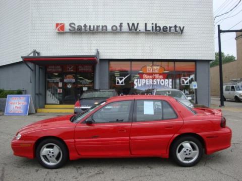 Bright Red Pontiac Grand Am GT Sedan.  Click to enlarge.