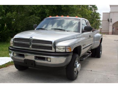 Bright Silver Metallic Dodge Ram 3500 SLT Club Cab 4x4 Dually.  Click to enlarge.