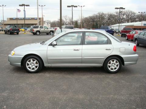 Silver Kia Spectra Sedan.  Click to enlarge.