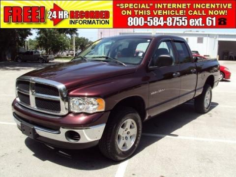 Deep Molten Red Pearl Dodge Ram 1500 SLT Quad Cab 4x4.  Click to enlarge.