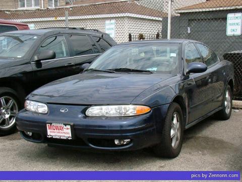 Midnight Blue Metallic Oldsmobile Alero GL Sedan.  Click to enlarge.