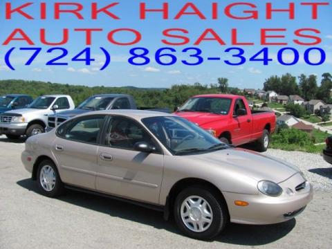 Light Prairie Tan Metallic Ford Taurus LX.  Click to enlarge.