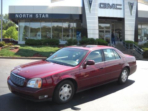 Cabernet Metallic Cadillac DeVille Sedan.  Click to enlarge.