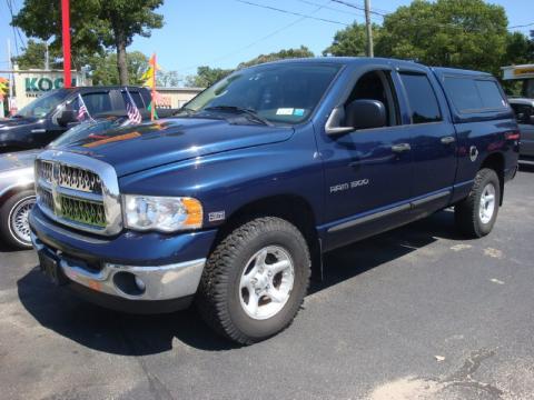 Patriot Blue Pearl Dodge Ram 1500 SLT Quad Cab 4x4.  Click to enlarge.