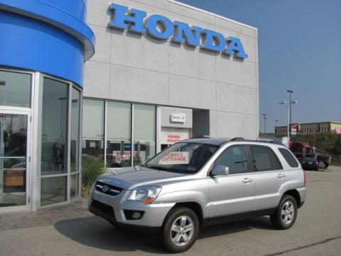 Bright Silver Kia Sportage LX V6 4x4.  Click to enlarge.