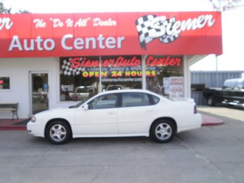 White Chevrolet Impala LS.  Click to enlarge.