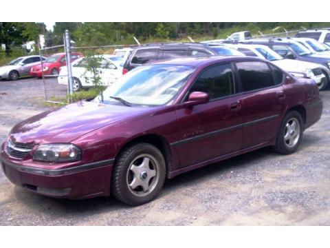 Dark Carmine Red Metallic Chevrolet Impala LS.  Click to enlarge.