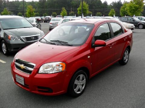 Sport Red Chevrolet Aveo LS Sedan.  Click to enlarge.