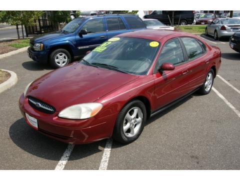 Matador Red Metallic Ford Taurus SES.  Click to enlarge.