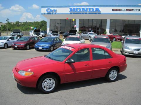 Bright Red Ford Escort SE Sedan.  Click to enlarge.