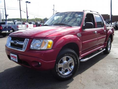 Red Fire Metallic Ford Explorer Sport Trac Adrenalin 4x4.  Click to enlarge.
