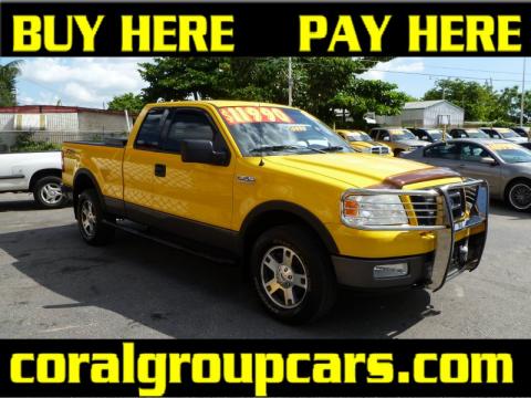 Blazing Yellow Ford F150 FX4 SuperCab 4x4.  Click to enlarge.