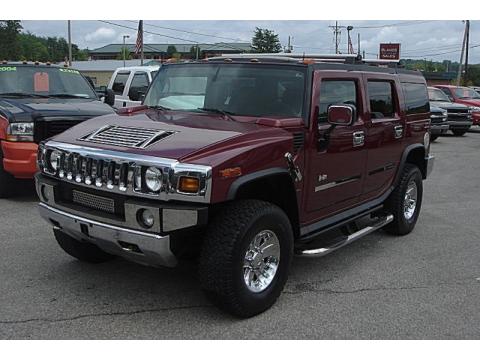 Red Metallic Hummer H2 SUV.  Click to enlarge.