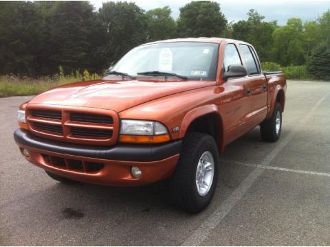 Amber Fire Pearl Dodge Dakota Sport Crew Cab 4x4.  Click to enlarge.